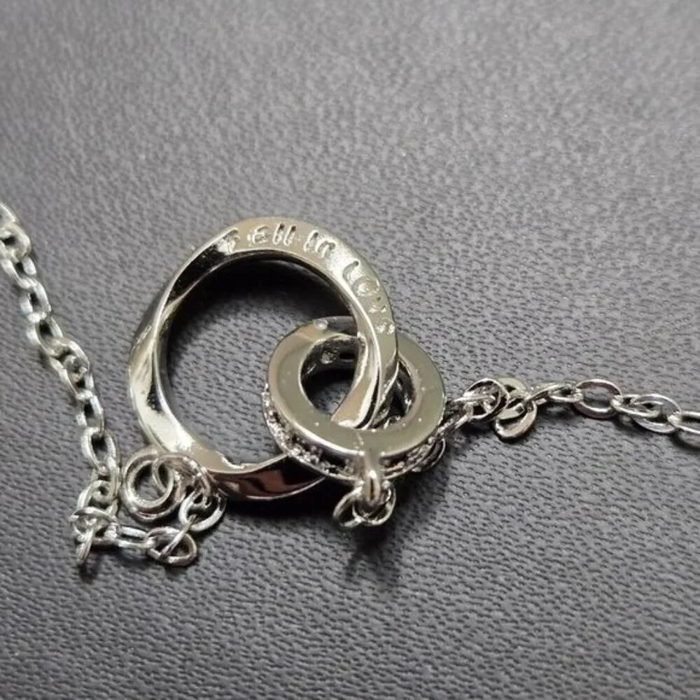 Interlocking Mobius Engraved Necklace in‎ Silver (NWOT)